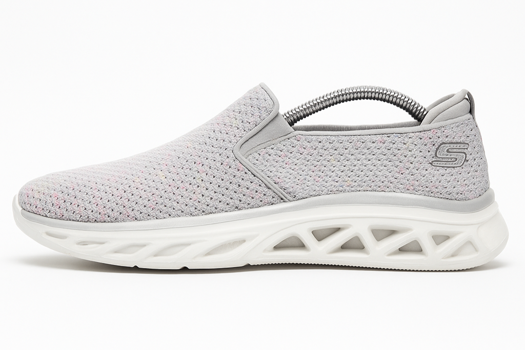 Gray slip-on sneaker with white sole on a white background